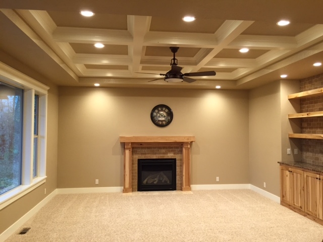 Living Room with Vaulted Ceiling and Fireplace
